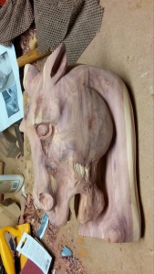beginning cedar horse head carving sanded more